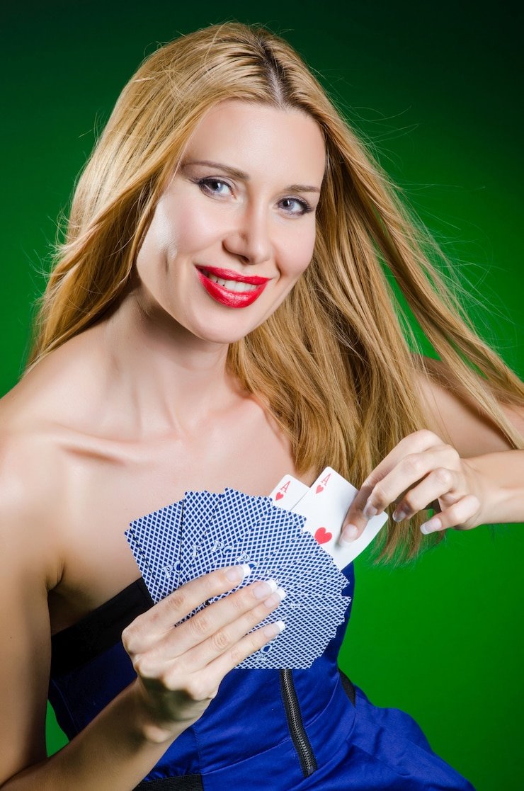 Live dealer handling cards with free-bet labeled chips visible