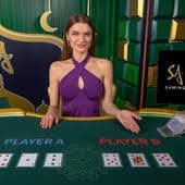Live dealer spinning the roulette wheel in studio
